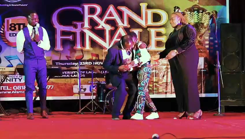 An award presentation at the grand finale