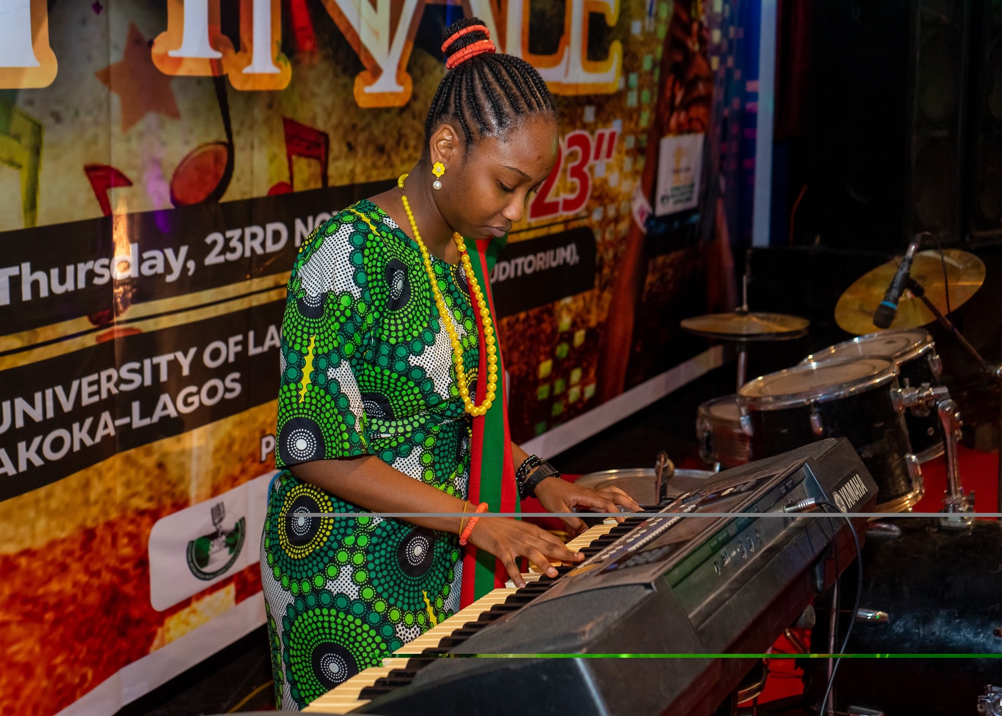 Student playing keyboard on the NISMCAA stage