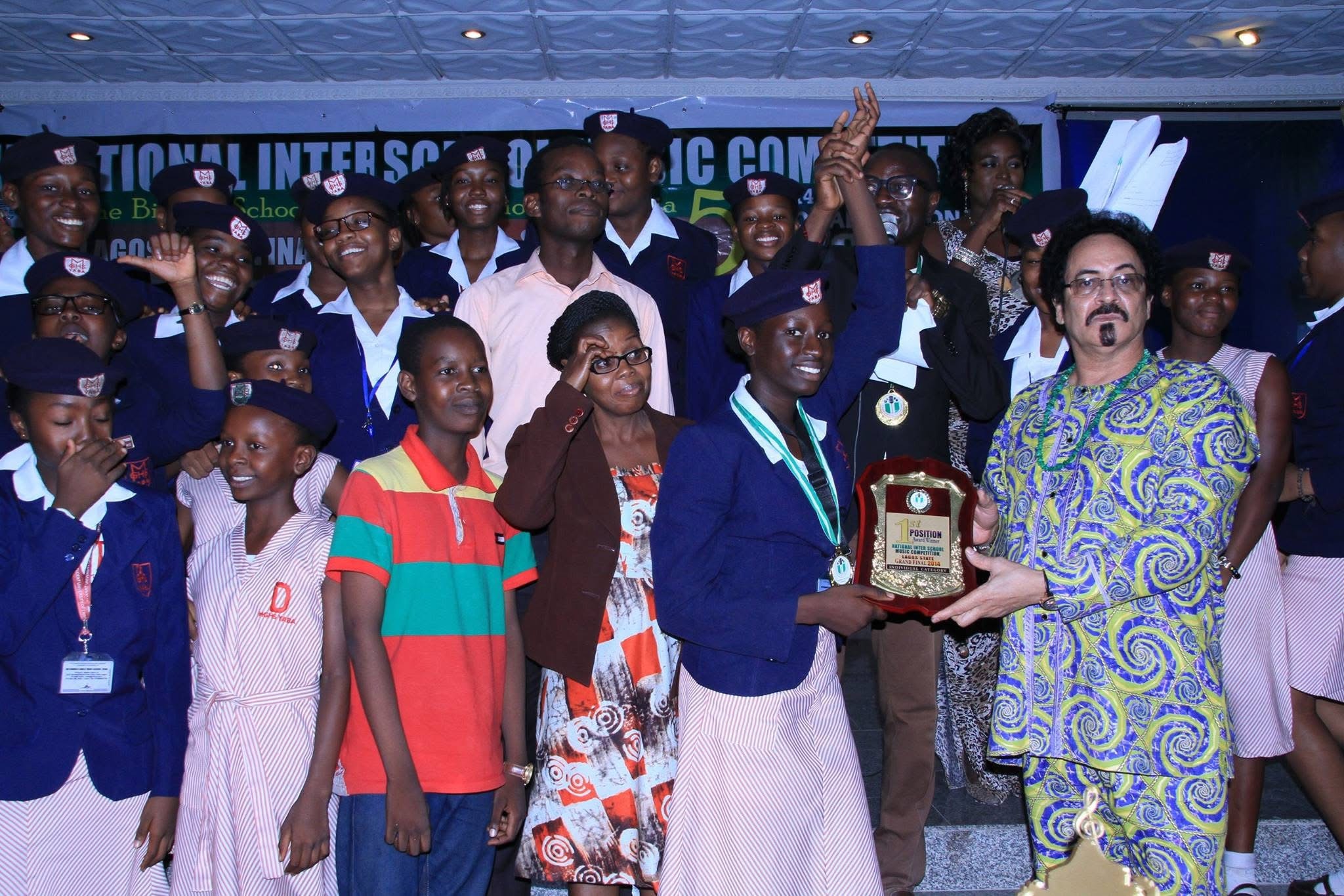 School group receiving a NISMCAA trophy