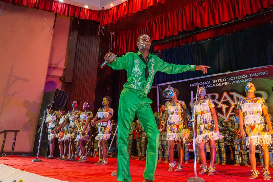 Students performing on the NISMCAA stage